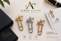 Trombones personnalisés avec logo Alpha Group en finitions dorée, argentée et or rose