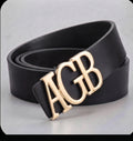 Ceinture IDENTITÉ NOIRE personnalisée avec les initiales AGB et boucle dorée