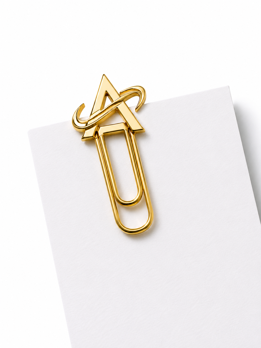 Trombones personnalisés avec logo Alpha Group en finitions dorée sur papier blanc.